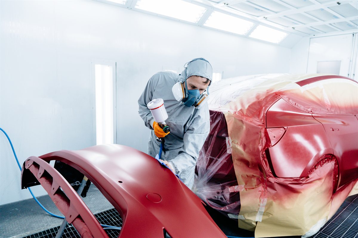 Bumper cover being sprayed in a spray booth
